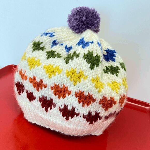 Rainbow Hearts Hand Knit Pom Pom Beanie, Winter Hat with Heart Design in Rainbow - Picture 3 of 8